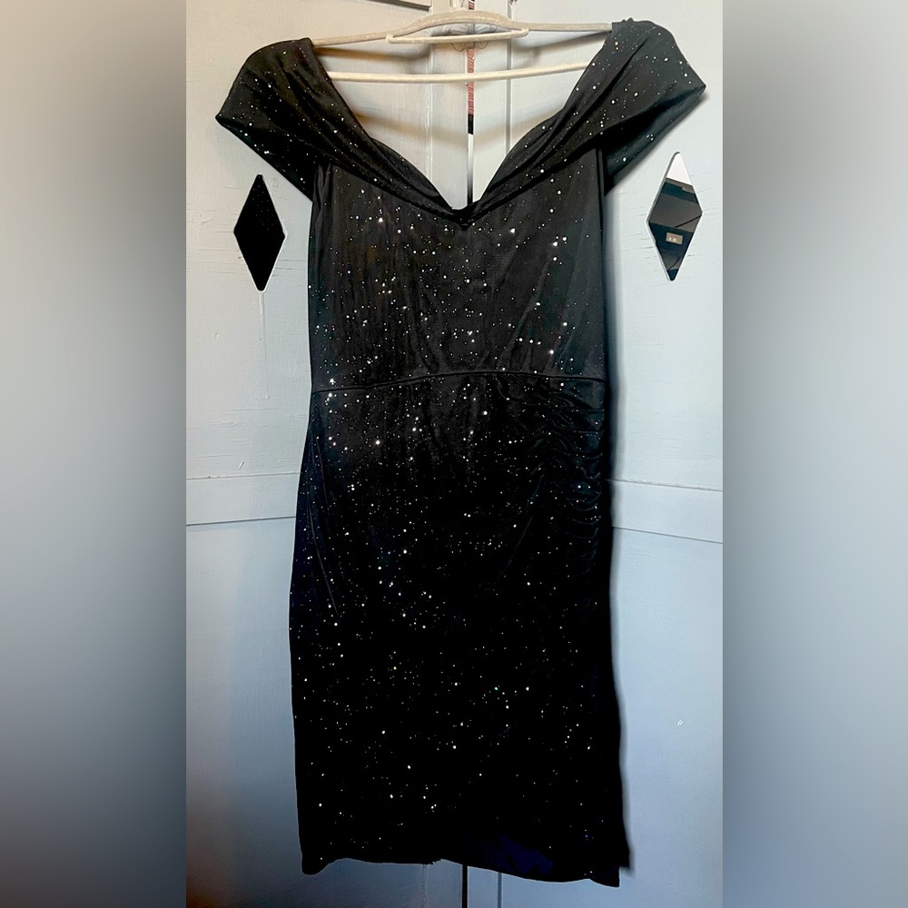 Black with a bit of sparkle. Perfect for cocktail/date night or special occasion